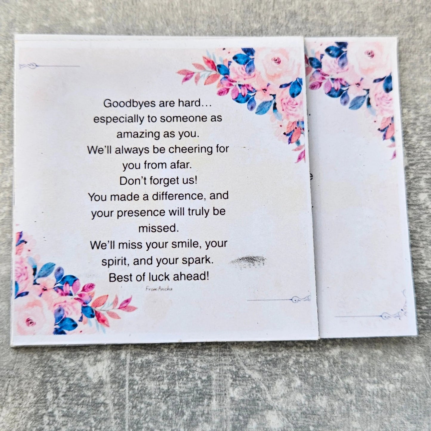 Floral card with text on a textured surface